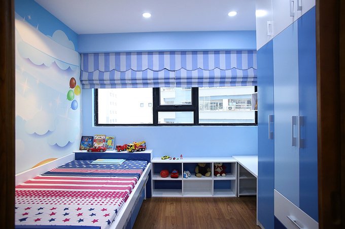 Phòng ngủ cho bé trai thích màu xanh và ô tô 